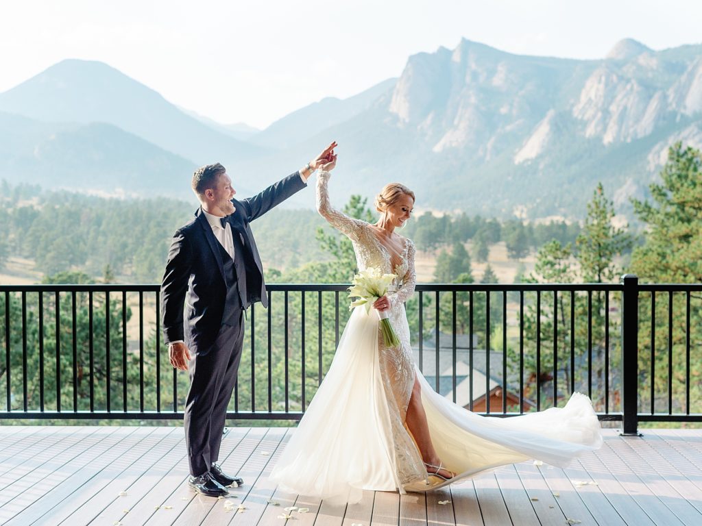 Bride and groom dancing on patio of The Boulders at Black Canyon Inn