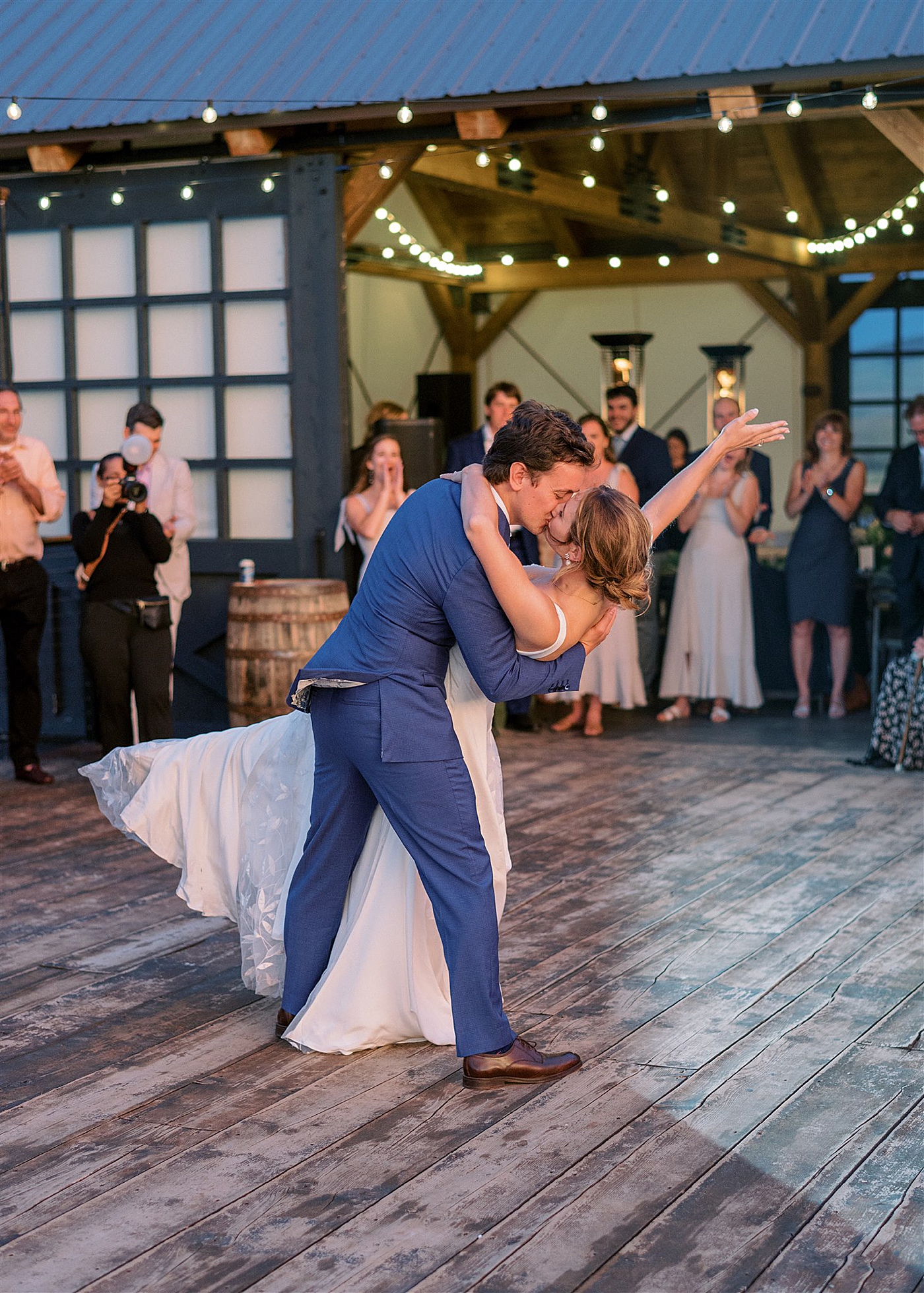 Groom dipping bride during first dance | McArthur Weddings and Events