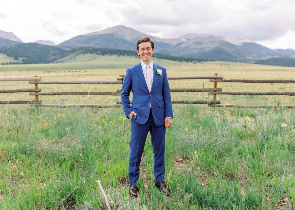 Groom in blue suit at Three Peaks Ranch | McArthur Weddings and Events