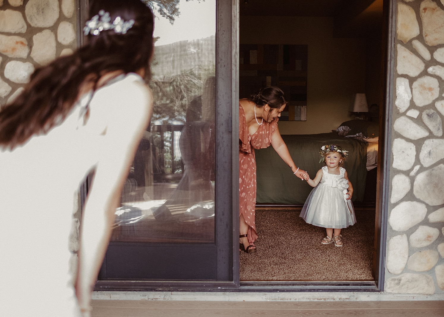 First look with niece at Colorado Airbnb wedding | McArthur Weddings and Events