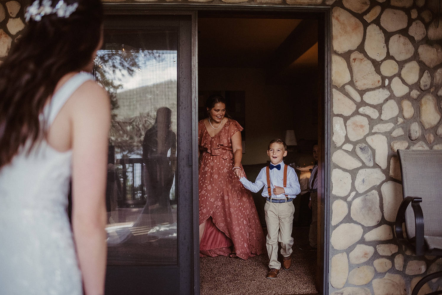 First look with nephews at Colorado Airbnb wedding | McArthur Weddings and Events