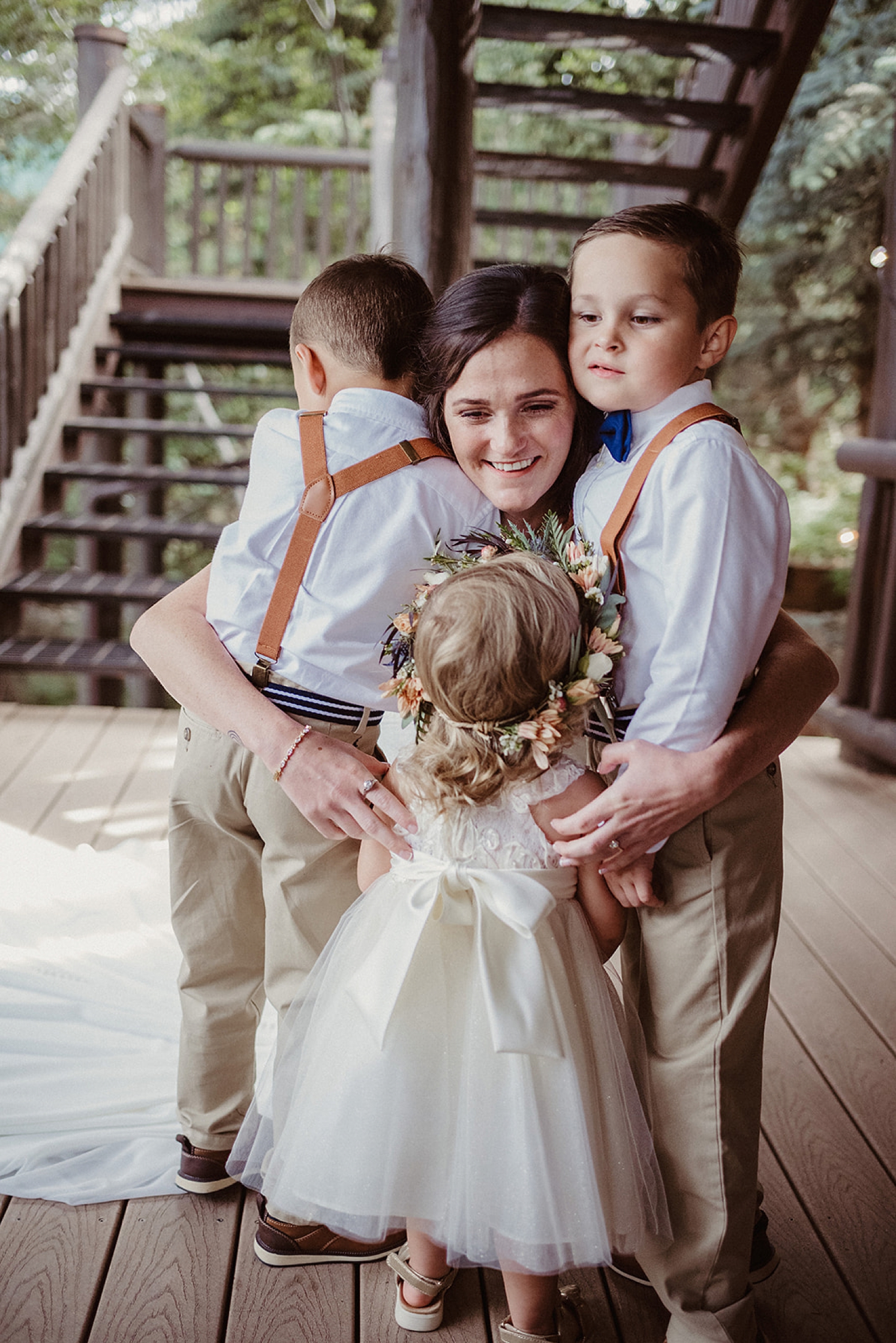 Hugging niece and nephews after first look | McArthur Weddings and Events