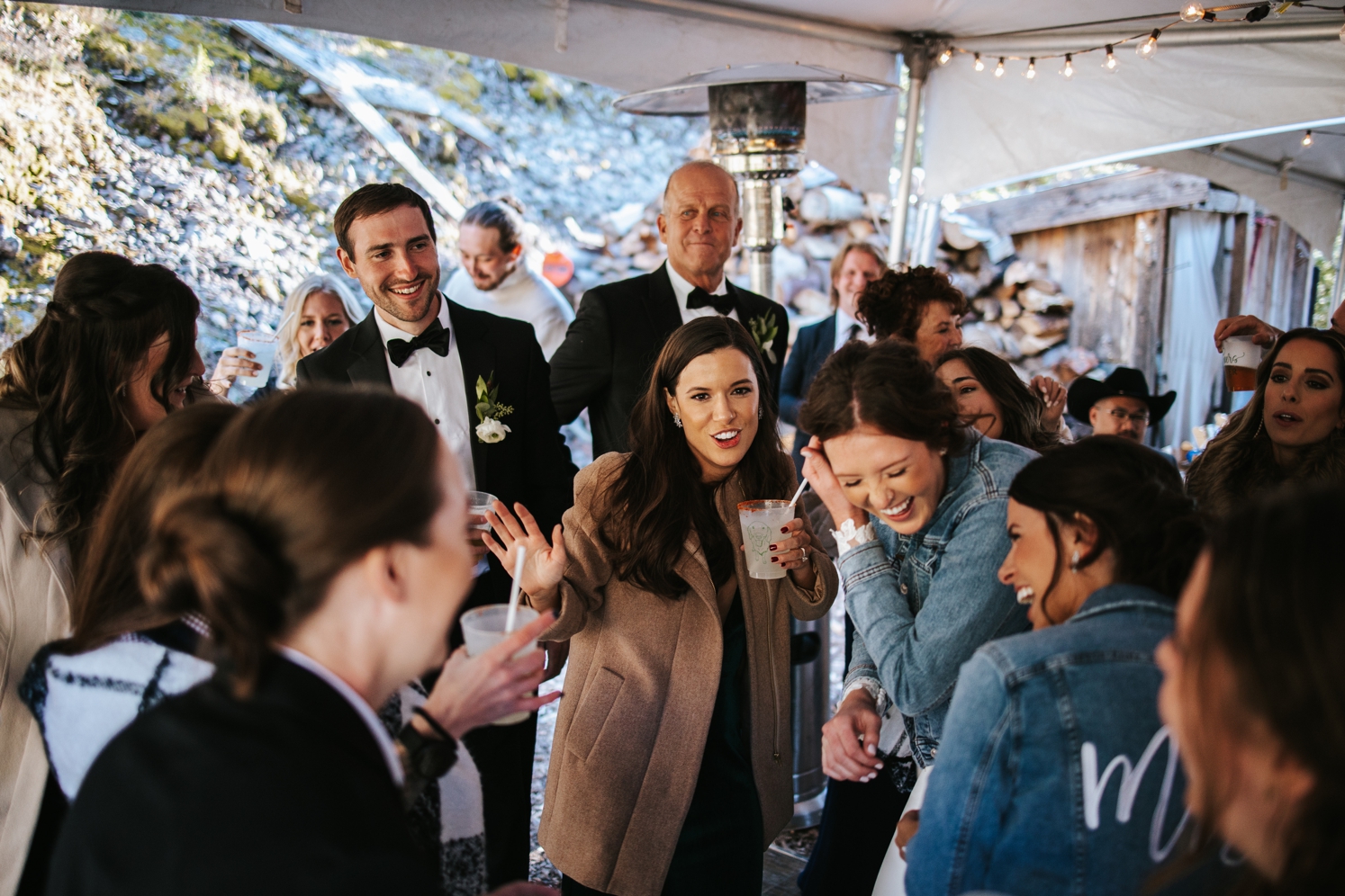 Brides dancing with wedding guests at Telluride wedding reception | McArthur Weddings and Events