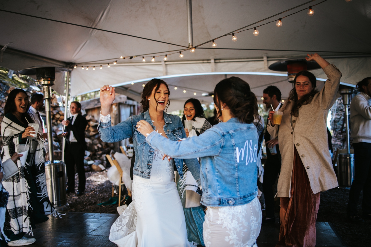 Brides dancing at wedding reception | McArthur Weddings and Events