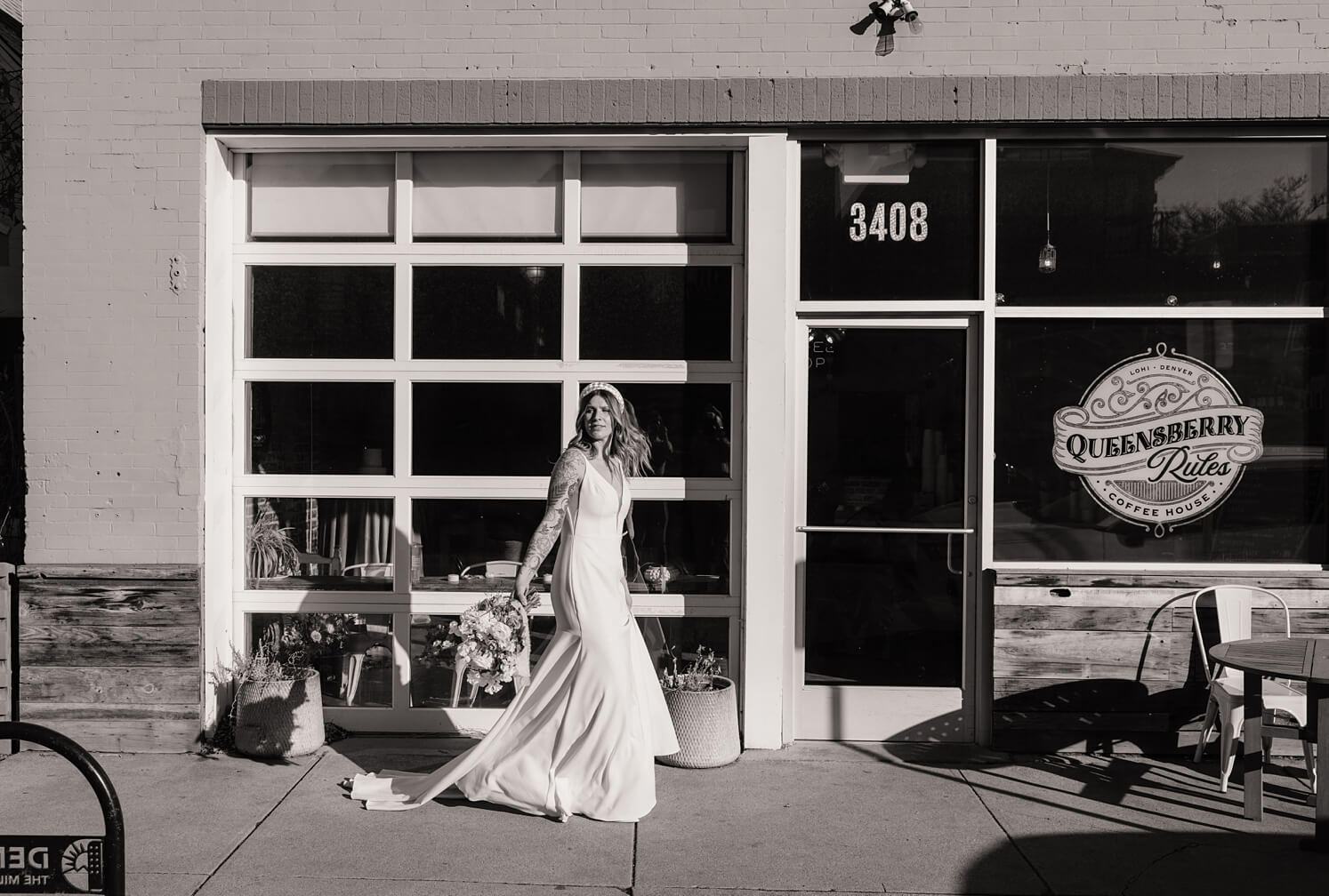 Bride walking in front of Queensbury Rules Coffee House | McArthur Weddings and Events