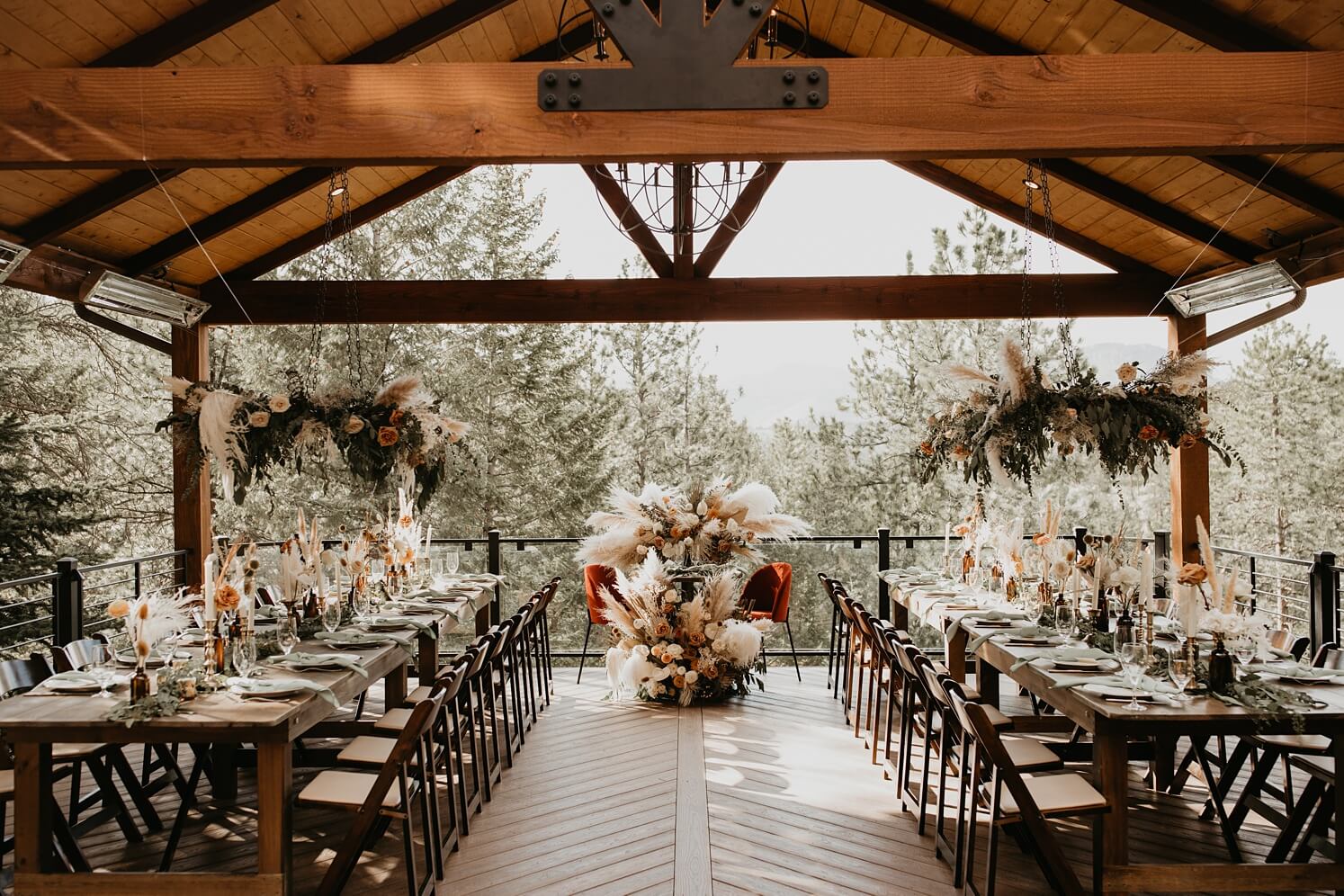 Wedding floral design: boho wedding reception flowers full of pampas grass and white and peach flowers | McArthur Weddings and Events
