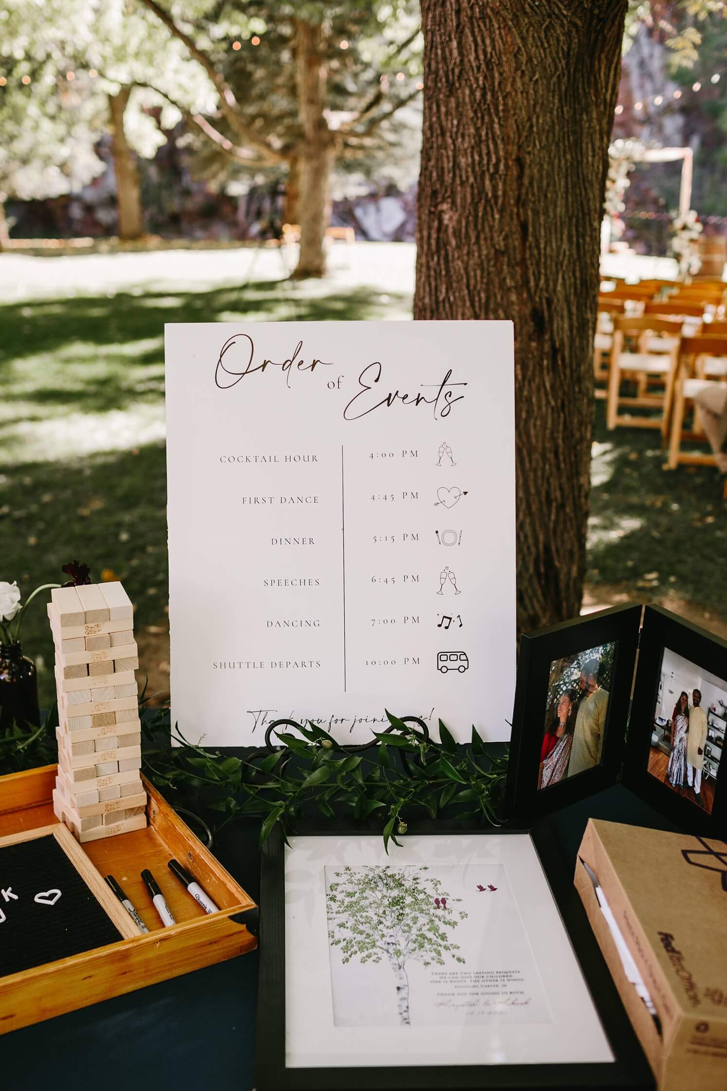 Wedding signs checklist: White order of events sign at wedding   | McArthur Weddings and Events