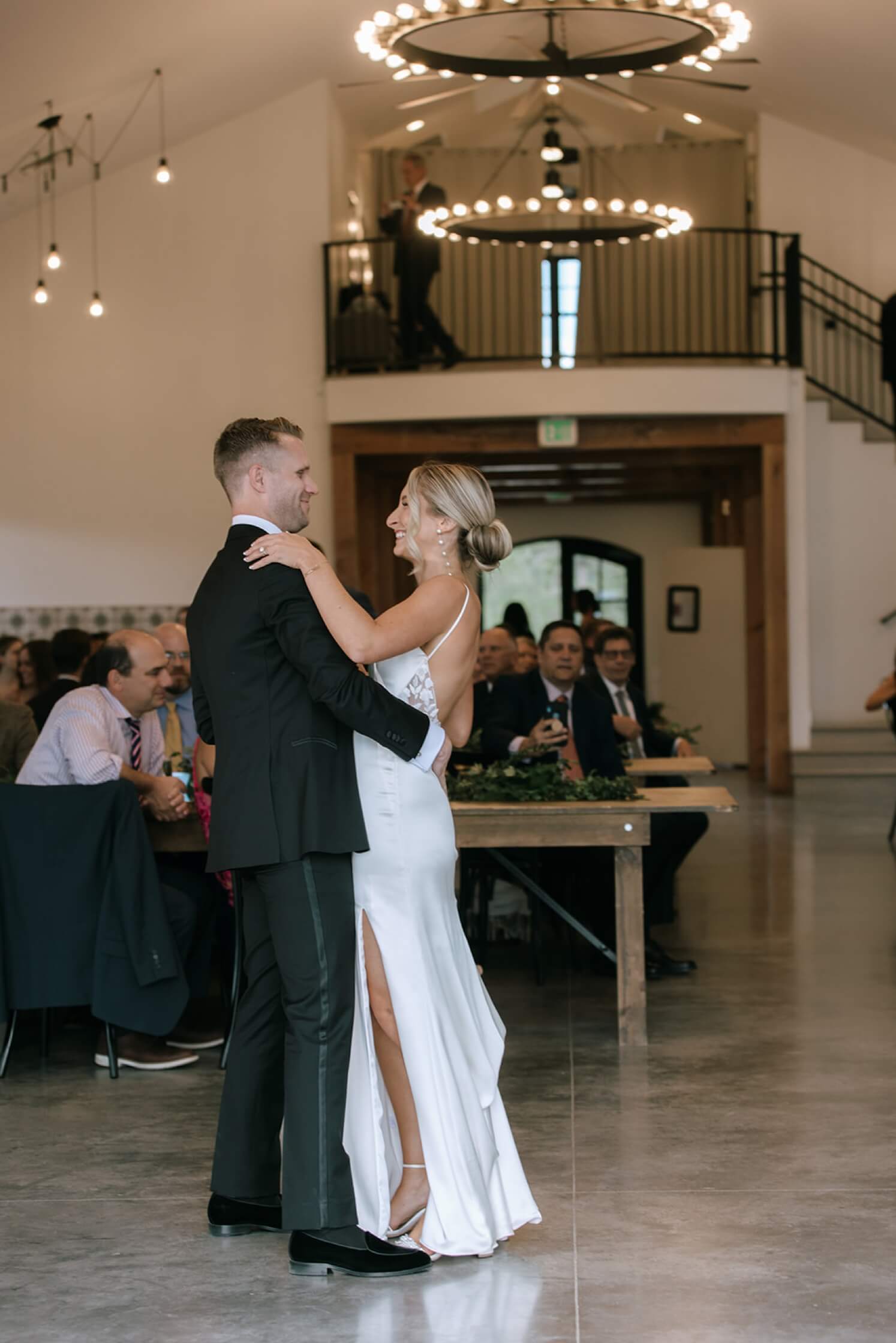 Couple dancing during first dance at North Star Gatherings in post about true cost of a wedding venue