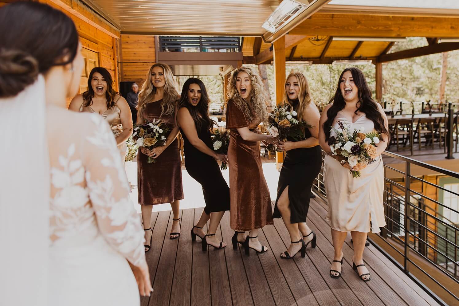 Bridesmaids seeing bride for the first time | McArthur Weddings and Events