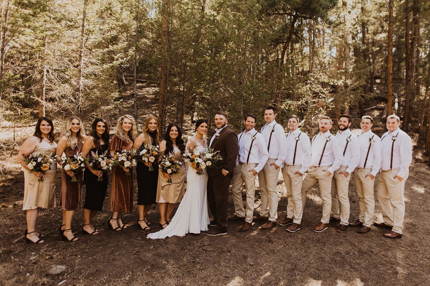 Bride and groom with wedding party in shades of brown | McArthur Weddings and Events