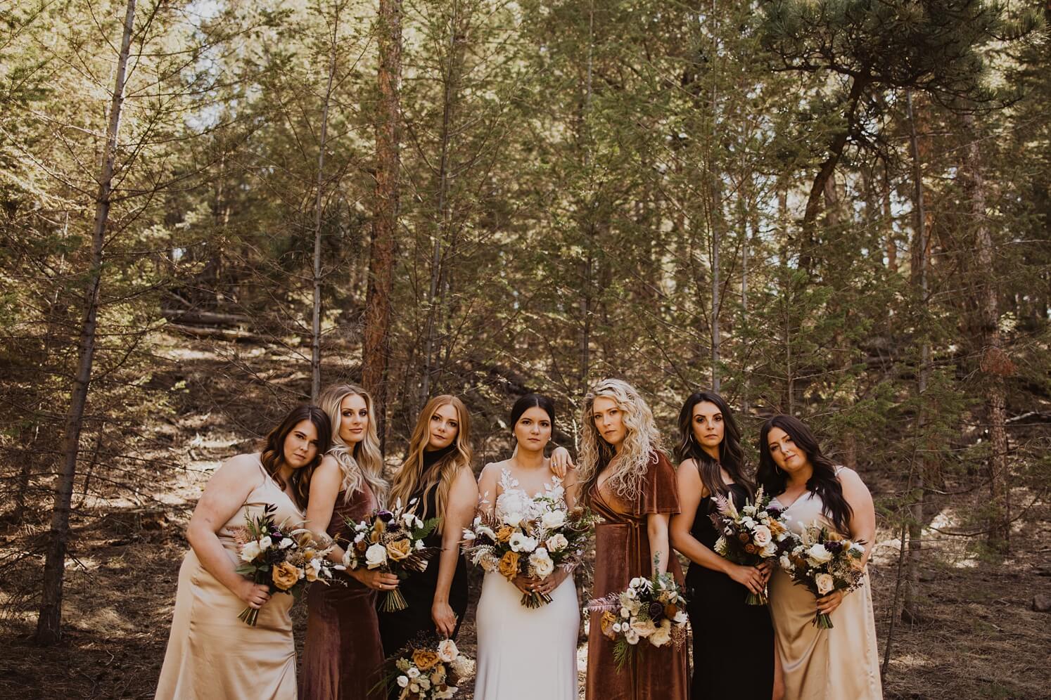 Bride with bridesmaids in shades of brown | McArthur Weddings and Events