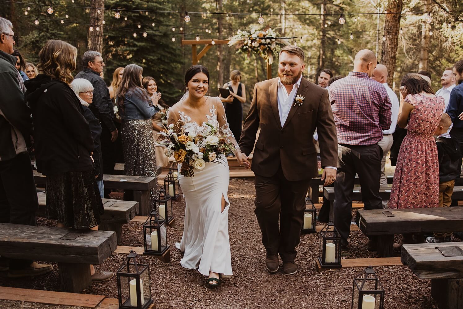 Bride and groom exiting ceremony at Evergreen wedding venue | McArthur Weddings and Events