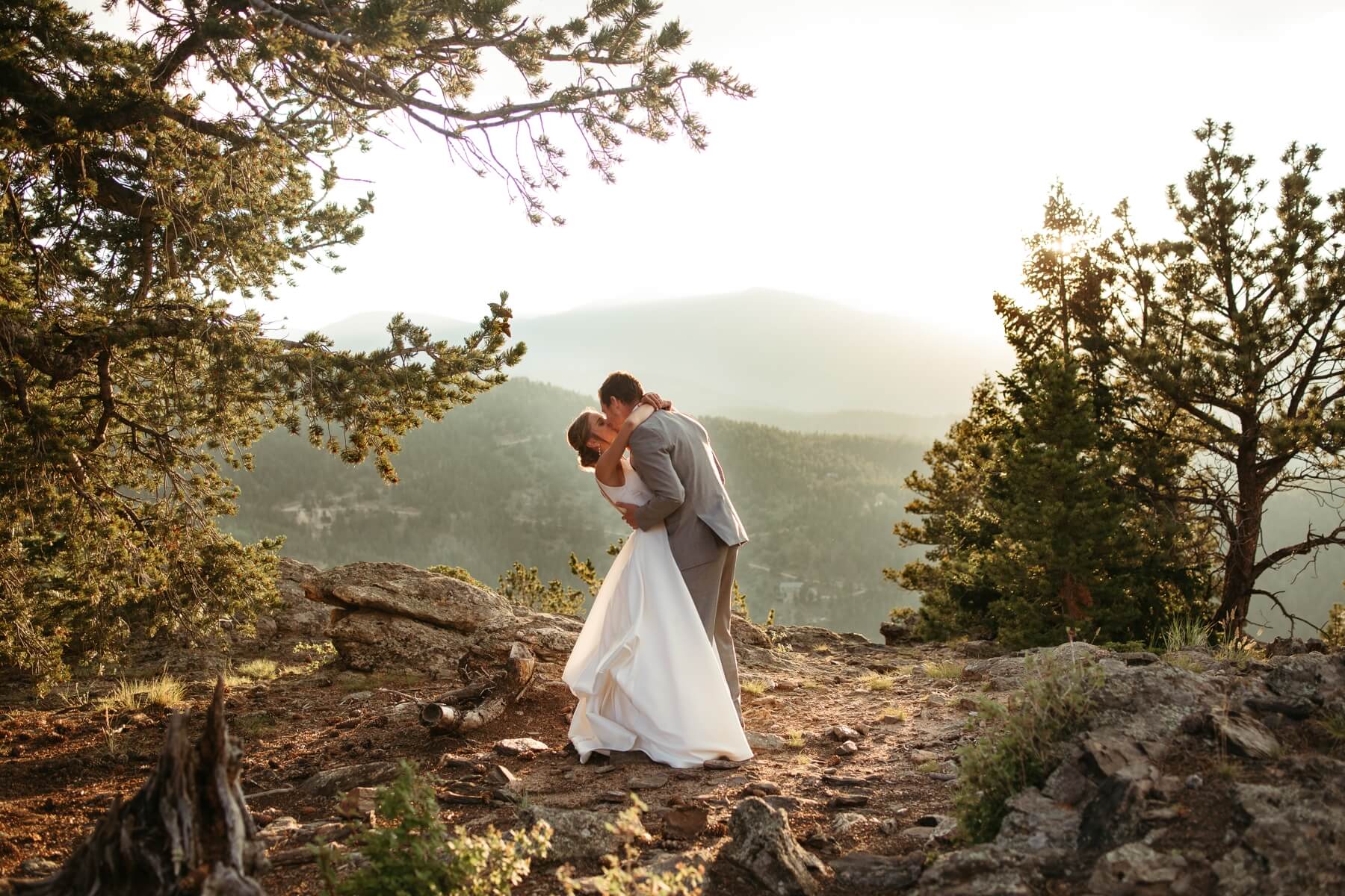 Bride and groom having private first dance at sunset at North Star Gatherings, a Colorado mountain wedding venue