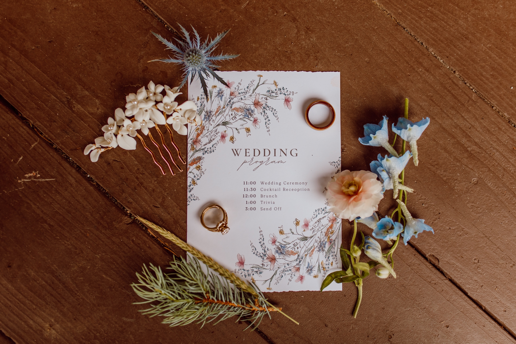 Wildflower wedding program with wedding ring and hair clip